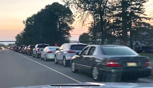 Vehicles line up for miles to cross into Canada
